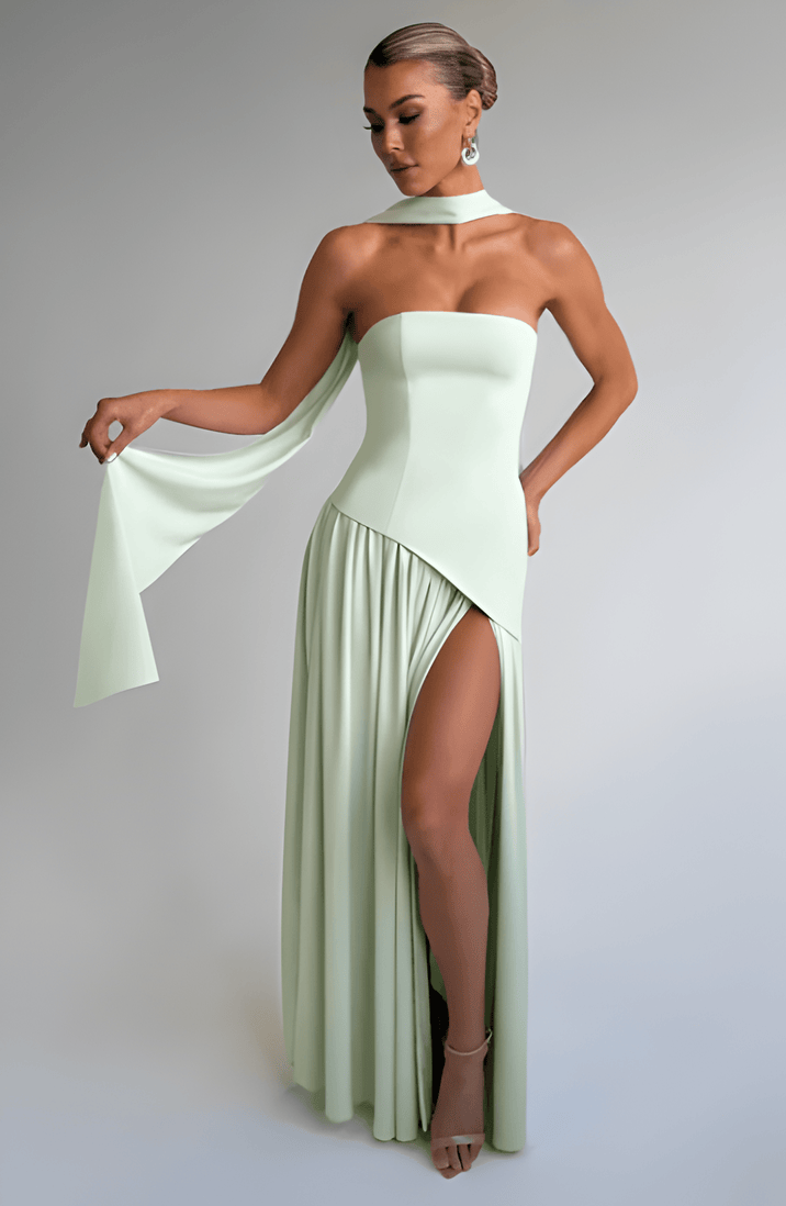 Strapless long slit maxi dress in mint green, fitted bodice, draped skirt with side slit