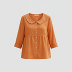 Orange cotton-linen peplum blouse with Peter Pan collar and button front