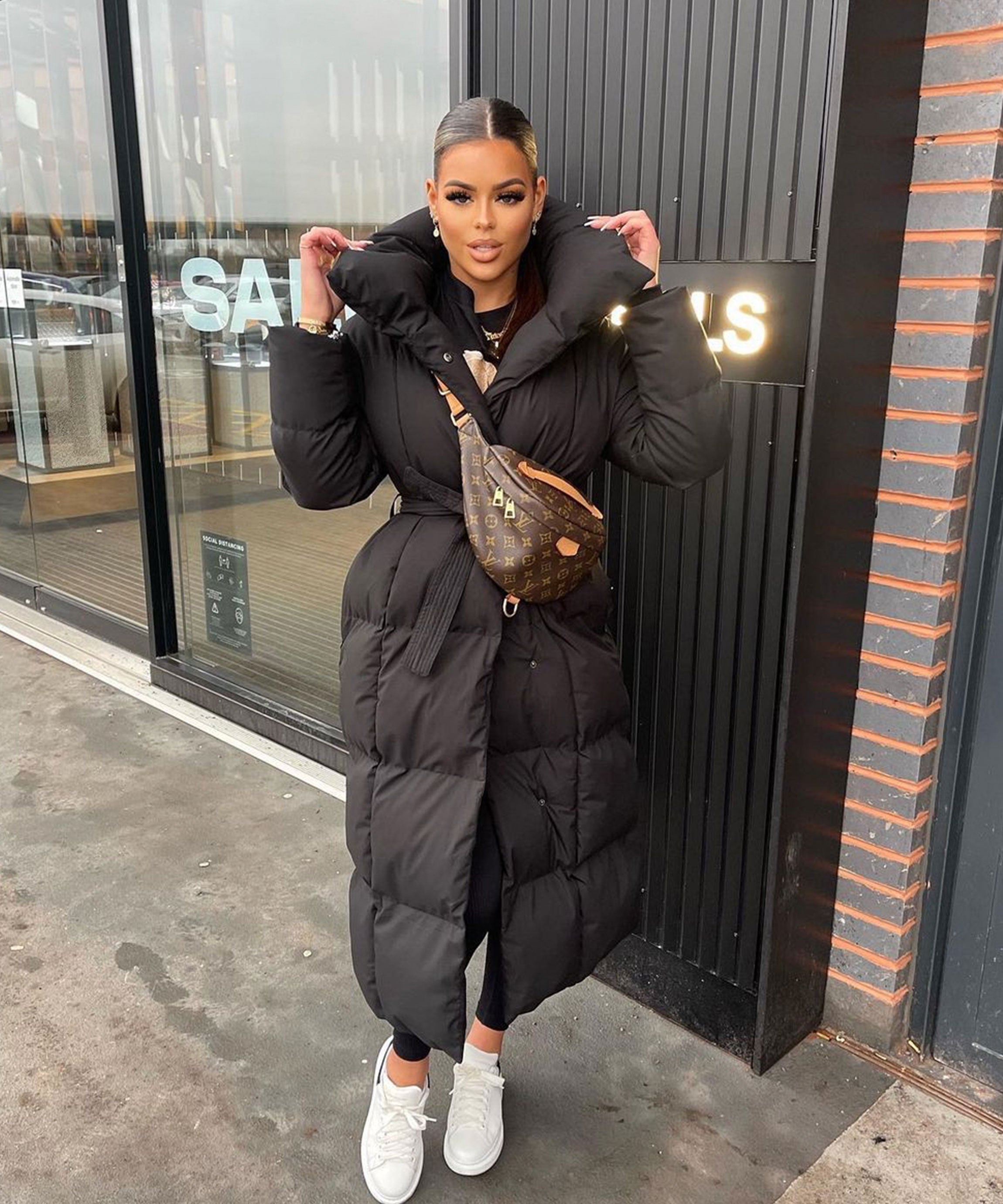 Black maxi puffer coat with hood and tie belt, quilted look and front closure