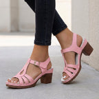 Pink women's T-strap sandals with block heel and cushioned footbed, buckle strap