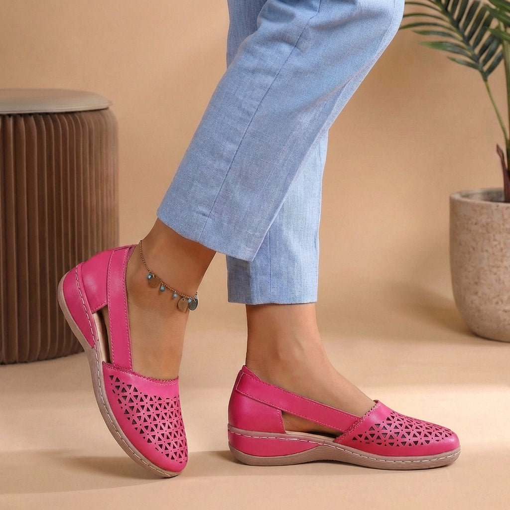Women's slip-on casual shoes in magenta pink with cutout design and open side