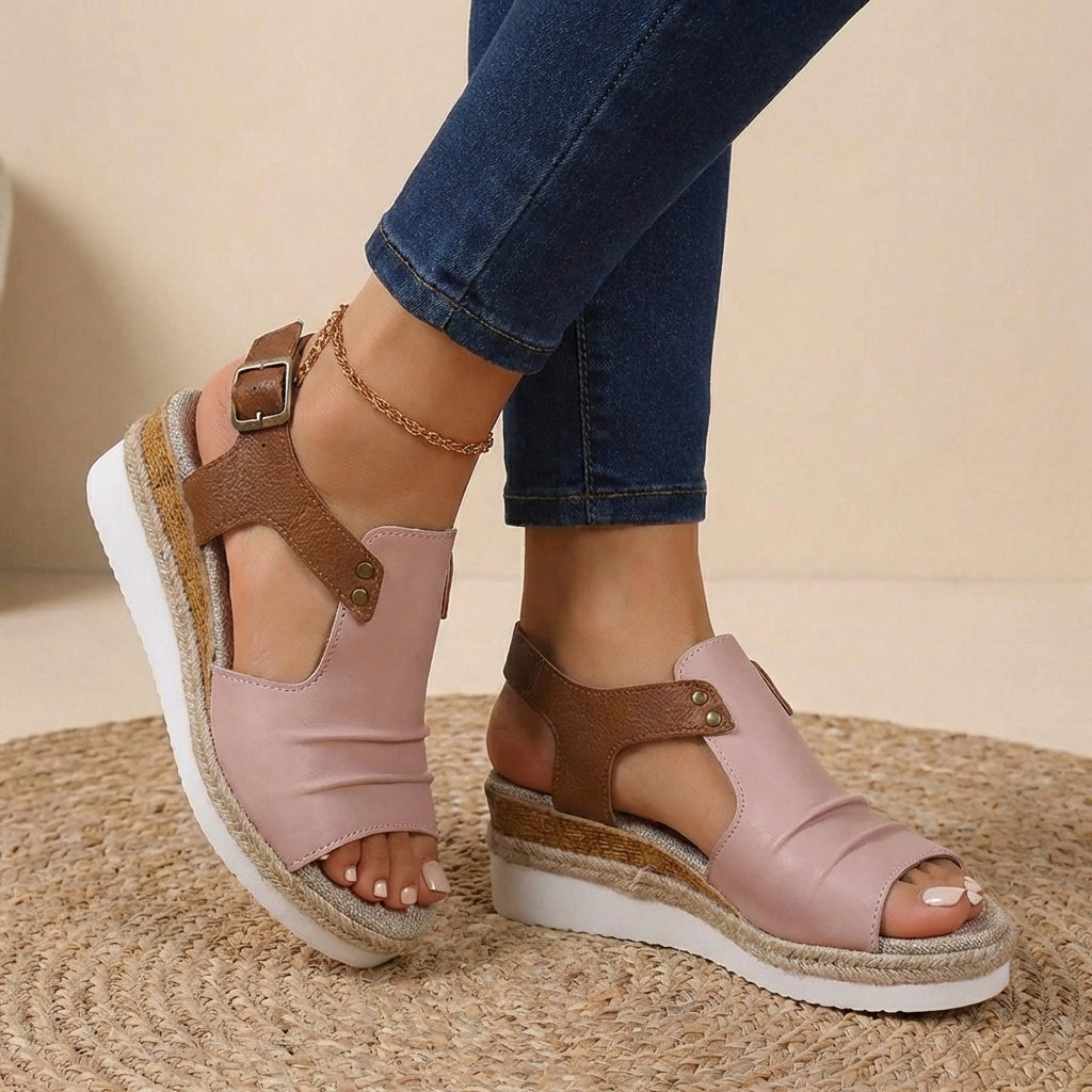 Pink and brown platform orthopedic sandals with buckled ankle strap and open toe