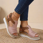 Pink and brown platform orthopedic sandals with buckled ankle strap and open toe