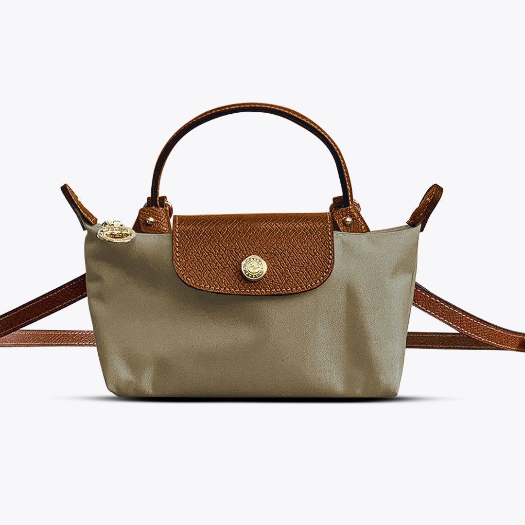 Mini crossbody shoulder bag in khaki with tan flap and gold-tone front clasp, crossbody strap