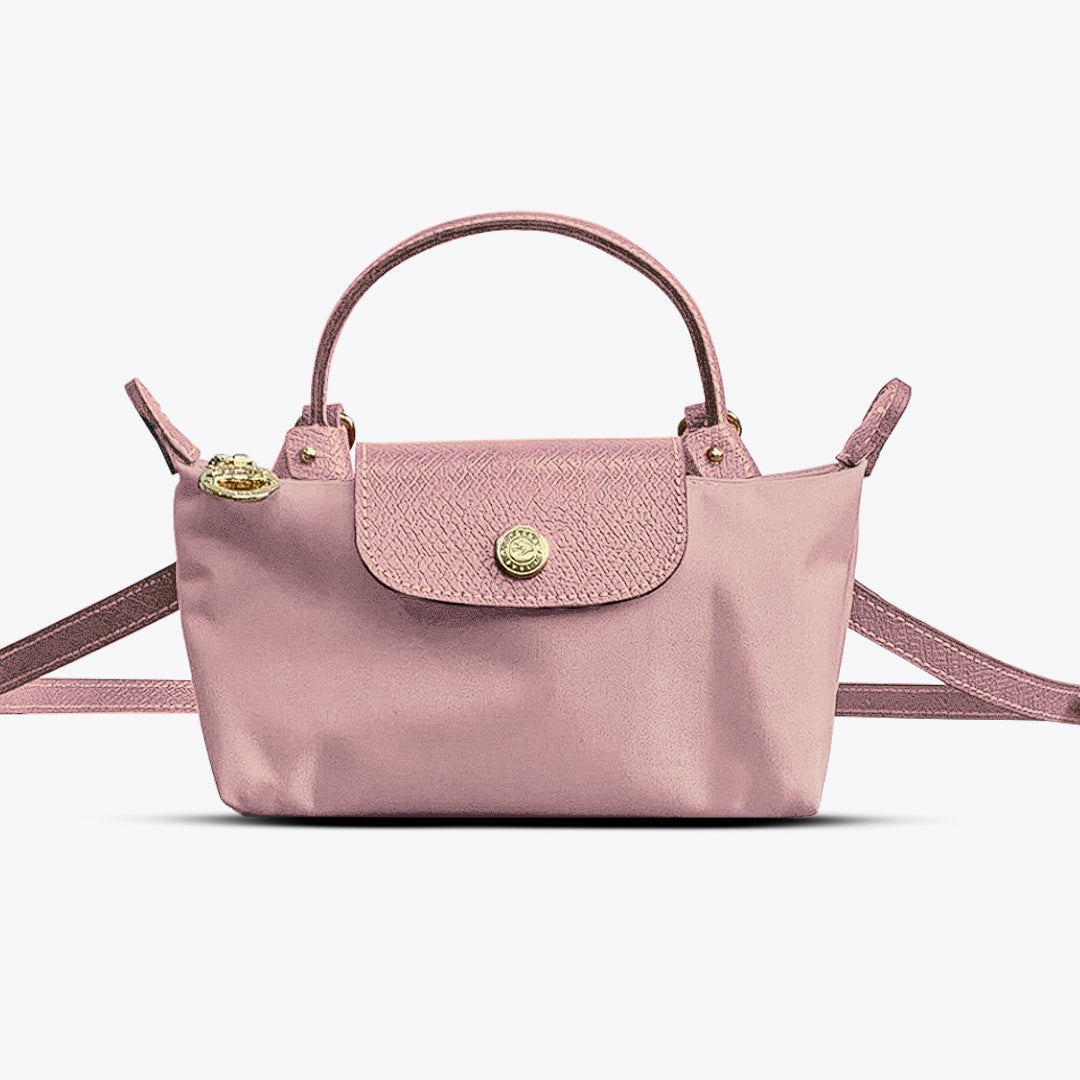 Mini crossbody shoulder bag in blush pink with matching flap and gold-tone front clasp
