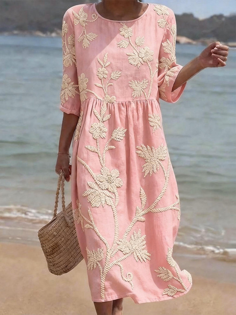 Light pink floral embroidered round-neck midi dress with gathered waist and 3/4 sleeves