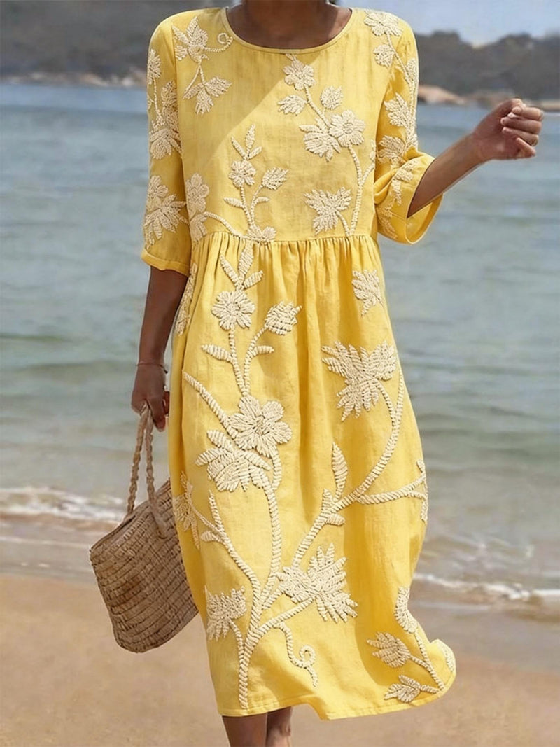 Yellow floral embroidered round-neck midi dress with gathered waist and 3/4 sleeves