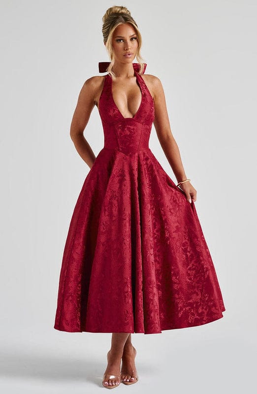 Burgundy sleeveless A-line midi dress with deep V-neck and full skirt.