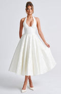 White sleeveless A-line midi dress with V-neck and gathered skirt.
