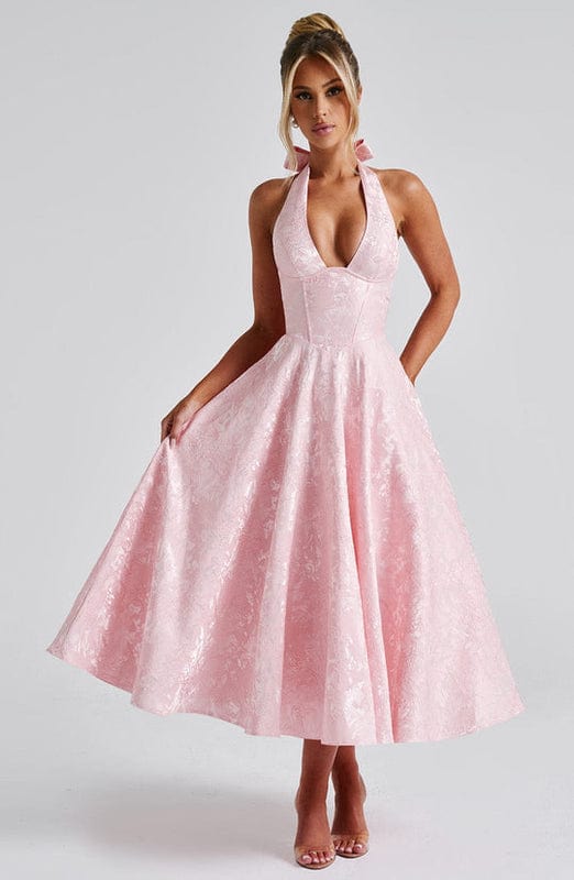 Light pink sleeveless A-line midi dress with deep V-neck and full skirt.