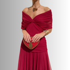 Red off-shoulder maxi dress with crossed bodice and flowing tiered skirt