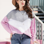 Women’s winter sweater with gray knit top, pink sleeves, white chevron pattern