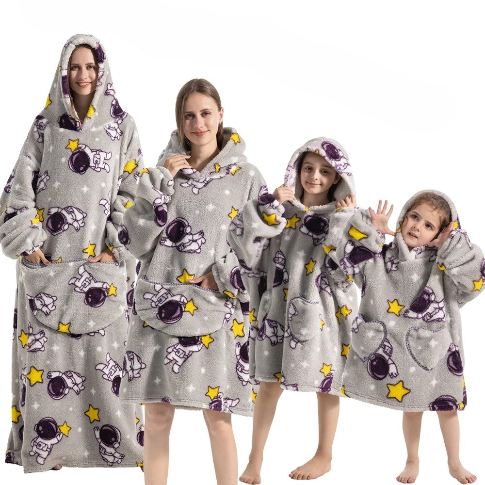 Light gray hoodie blanket with cartoon space pattern and front pocket hood
