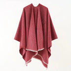 Cashmere poncho in dark red speckle, draped with V neckline and open-front wrap design