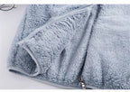 Light blue sherpa sleeveless bodywarmer with zip-front and pocket seam