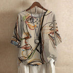 Women’s vintage floral print blouse with short sleeves, button front, V-neck, abstract multicolor on light base
