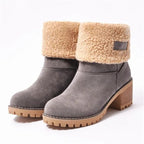 Women’s mid-calf winter boots in gray suede with tan shearling cuff and dark patch