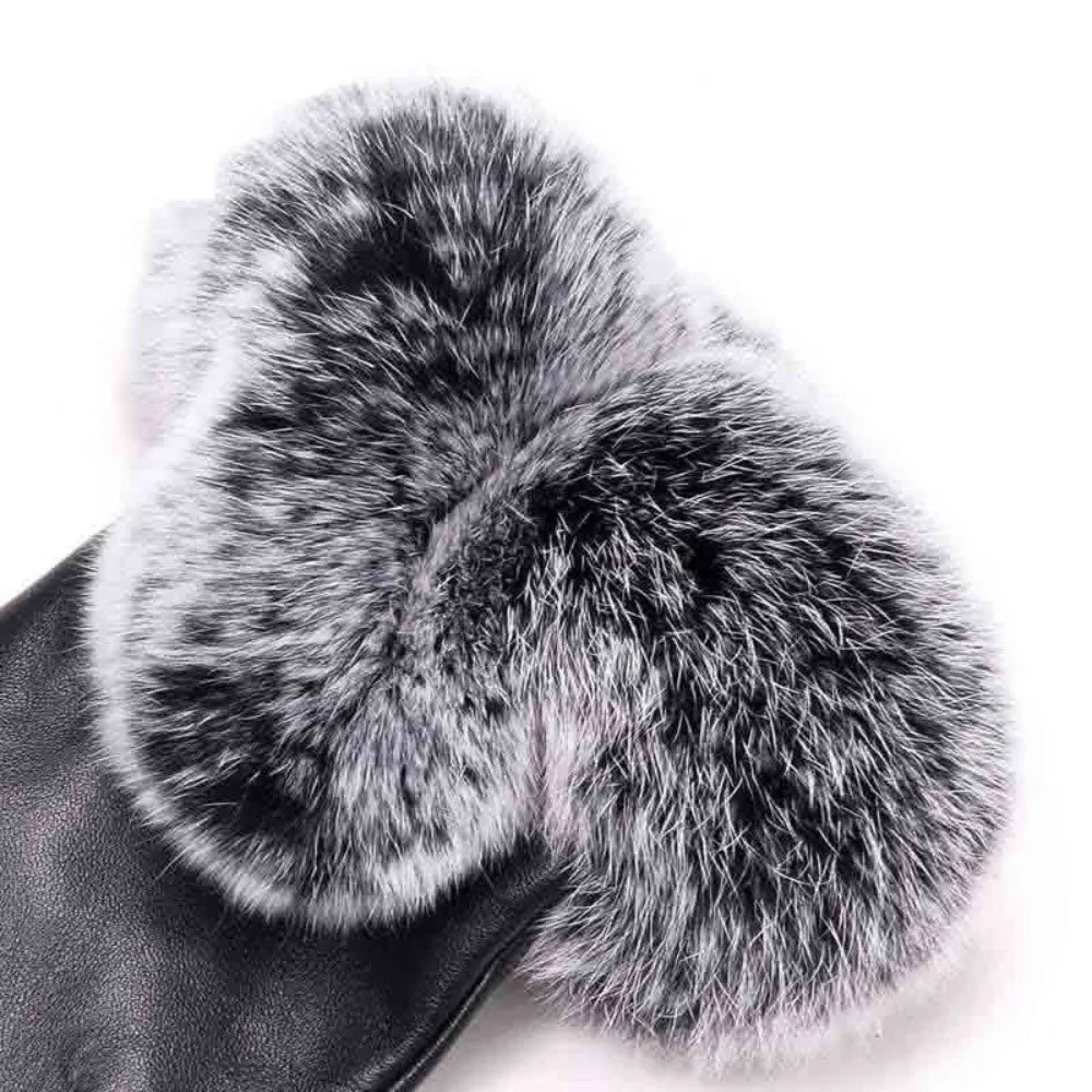 Dark leather gloves with plush gray faux fur cuffs and palm-side seams.
