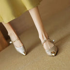 Metallic pointed kitten heels with pearl strap and gold buckle, small block heel