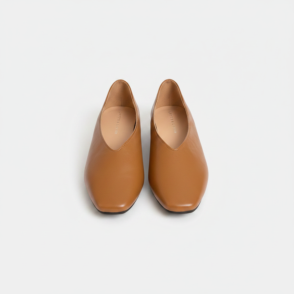 Brown slip-on flats with almond toe and supportive sole