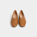 Brown slip-on flats with almond toe and supportive sole