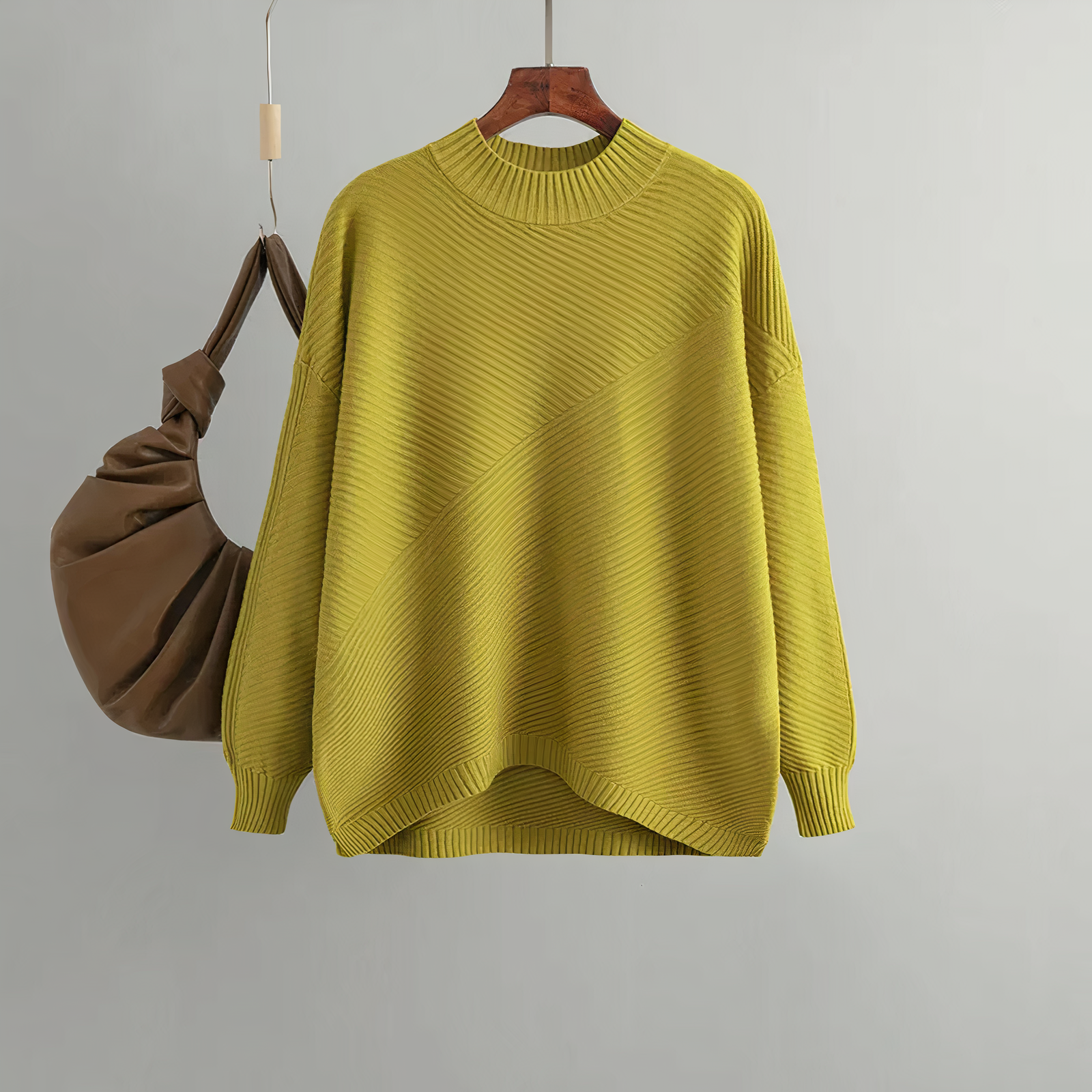 Yellow knit women's sweater with crew neck and ribbed cuffs, loose fit