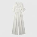 White chiffon wide-leg jumpsuit with V-neck and gathered waist with flowing wide legs
