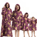 Purple hoodie blanket with sloth character print and front pocket hood
