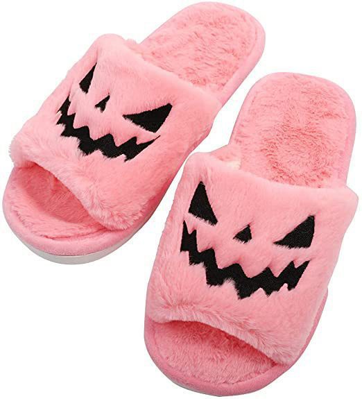 Women's pink plush Halloween jack-o-lantern slide slippers with black stitched face