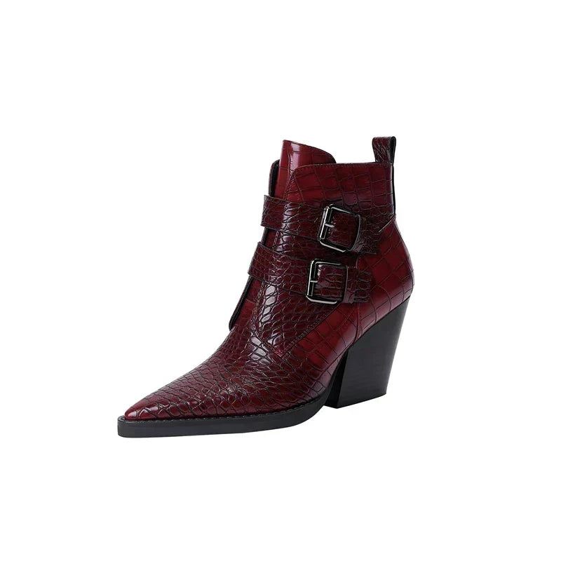 Women’s pointed-toe ankle boots in dark red with buckle strap detail