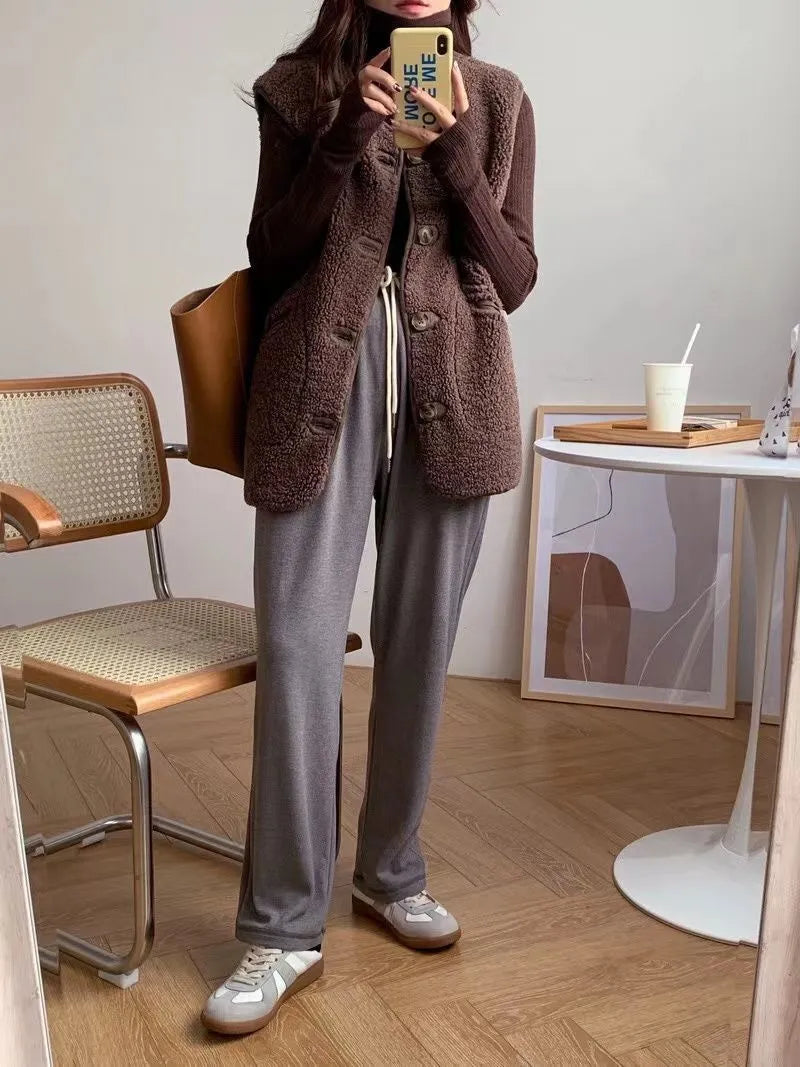 Chocolate brown sherpa wool gilet, sleeveless with button front and patch/flap pockets