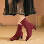 Burgundy knit ankle boots with stretch sock fit and block heel, pointed toe