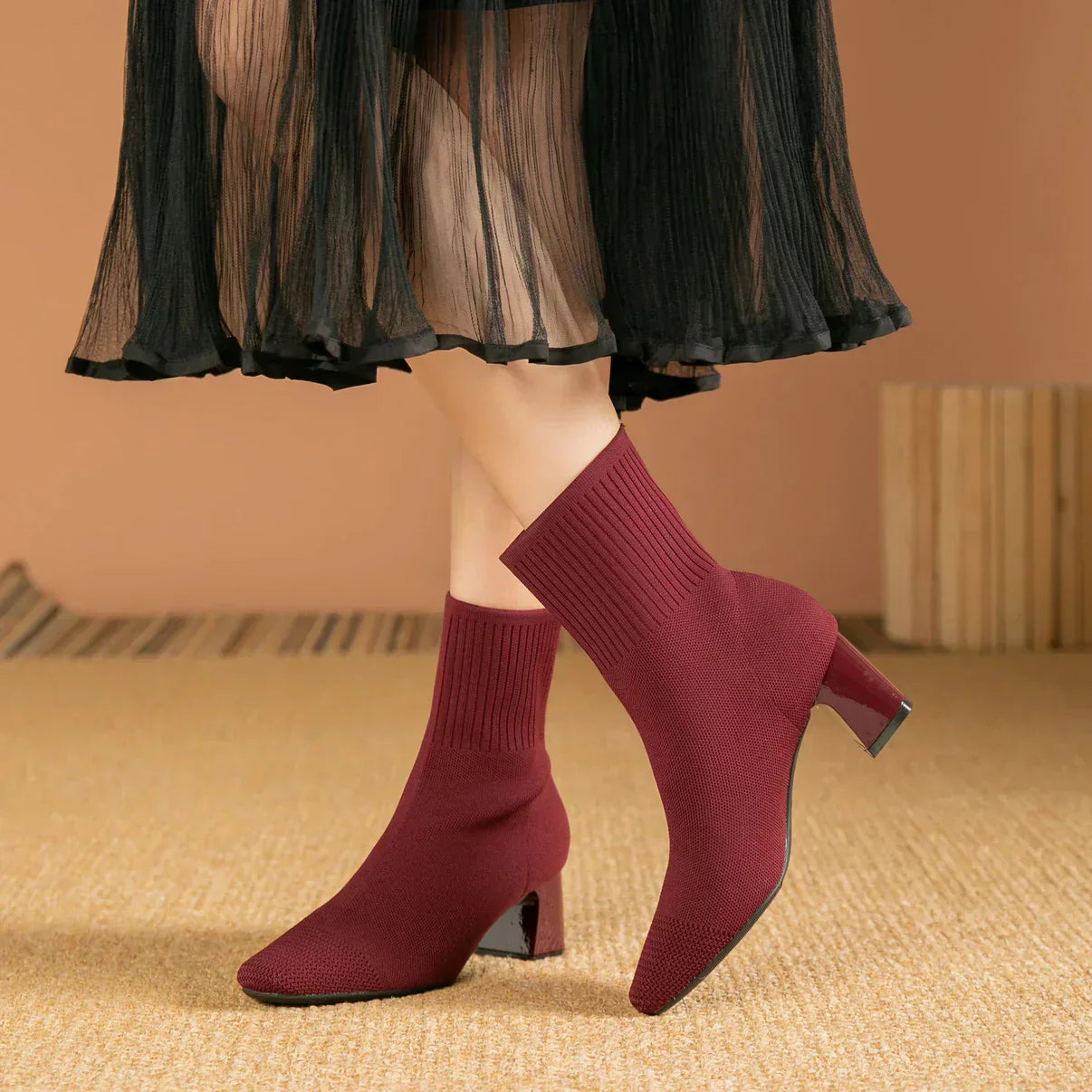 Burgundy knit ankle boots with stretch sock fit and block heel, pointed toe