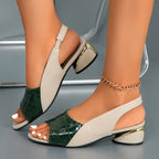 Green open-toe wedge sandals with cream straps and ankle chain detail