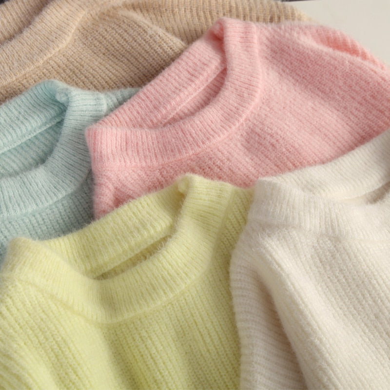 Cecile sweater close-up: ribbed crewneck knits in light pink, light yellow, and off-white