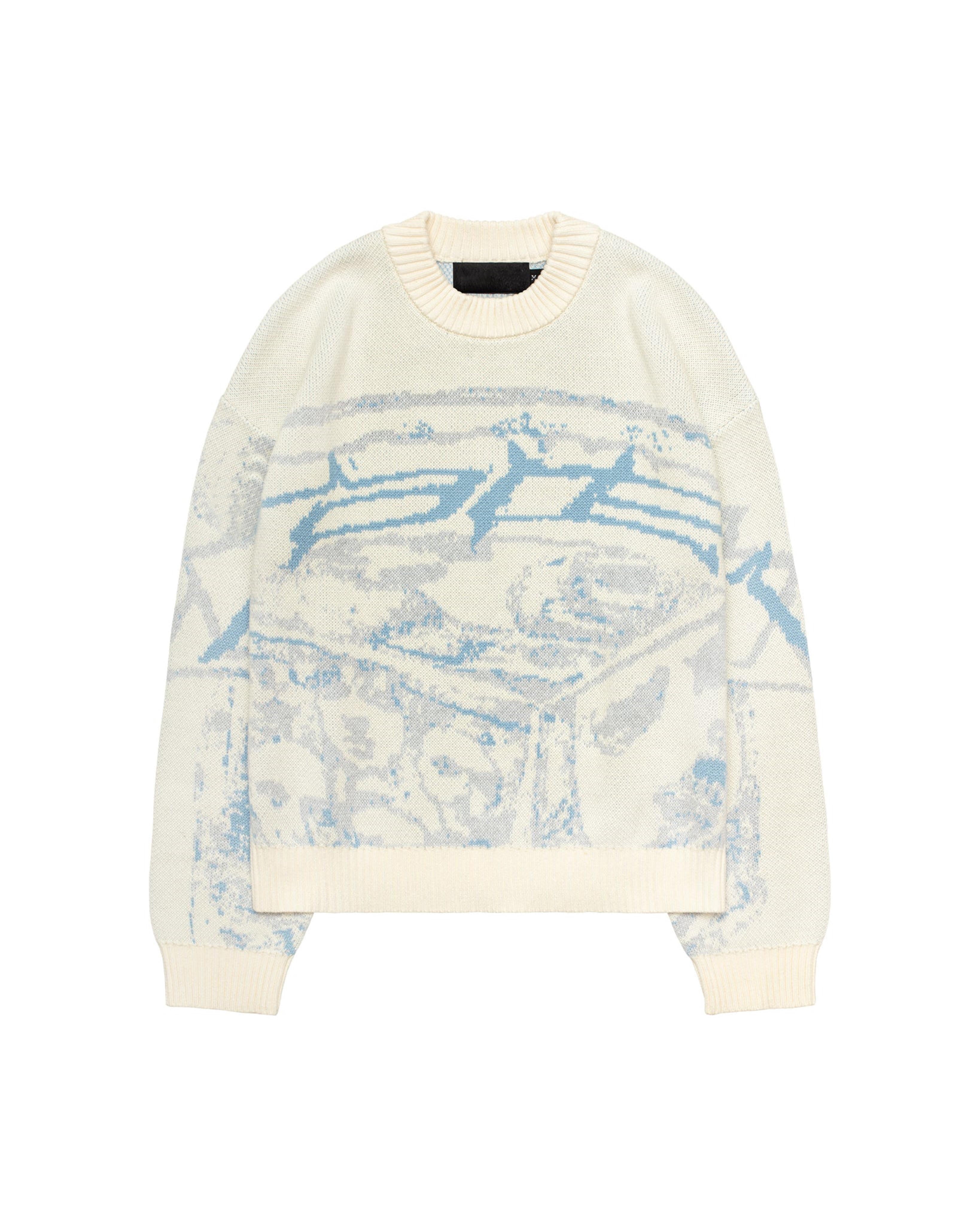 Cream crewneck knit sweater with blue abstract graphic, ribbed cuffs and hem