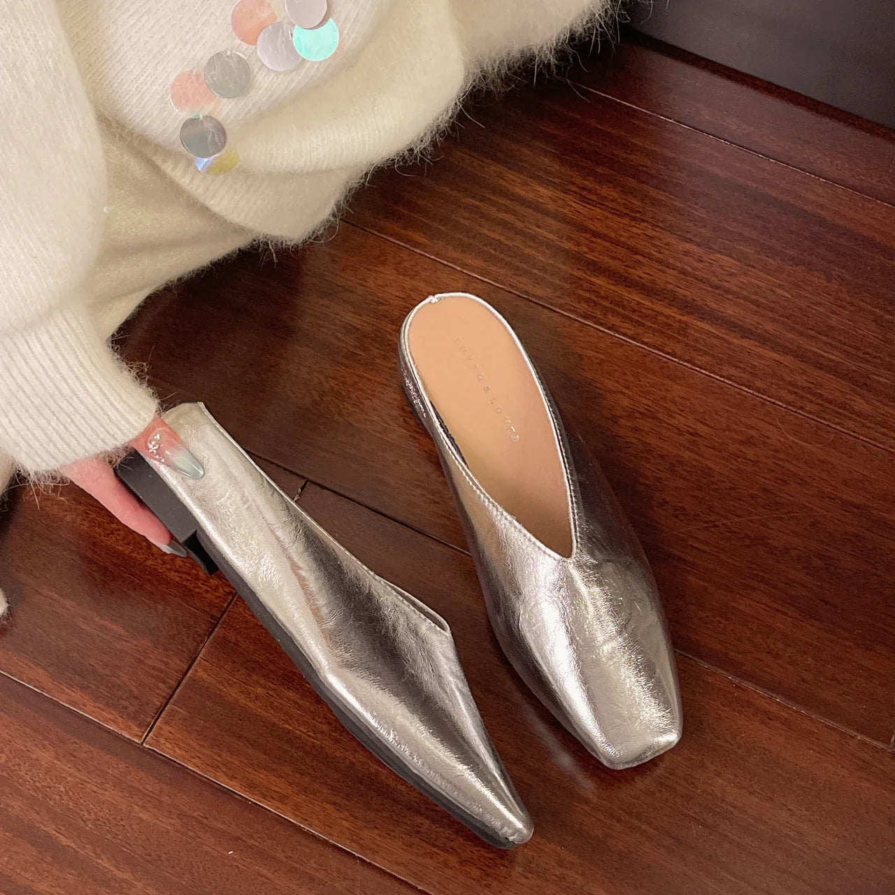 Women's slip-on flats with supportive sole in silver