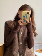 Brown wool-blend sherpa gilet, sleeveless, button-front closure and two flap pockets