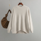 White knit women's sweater with crew neck, ribbed hem and cuffs, oversized fit