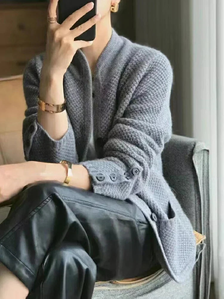 Gray textured knit jacket with button front and stand collar, long sleeves