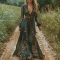 Embroidered bohemian maxi dress with V-neck and waist tie belt in green, floral accents