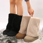 Women’s tall boots shown in black and beige, both with fuzzy cuffs and platform base