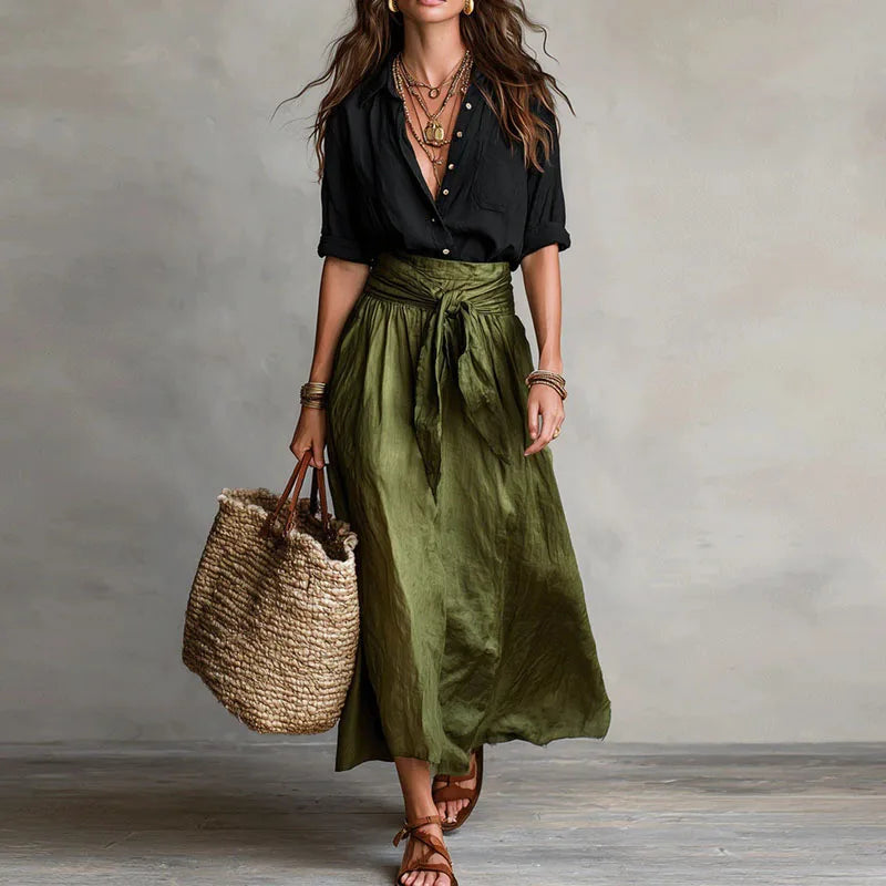 Linen co-ord set with black button-front blouse and olive green tie-waist skirt