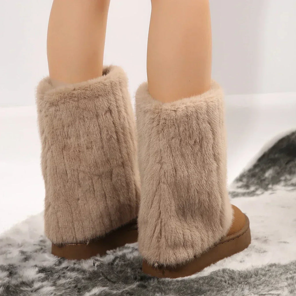 Women’s tall platform boots with plush light-brown fuzzy exterior and thick base