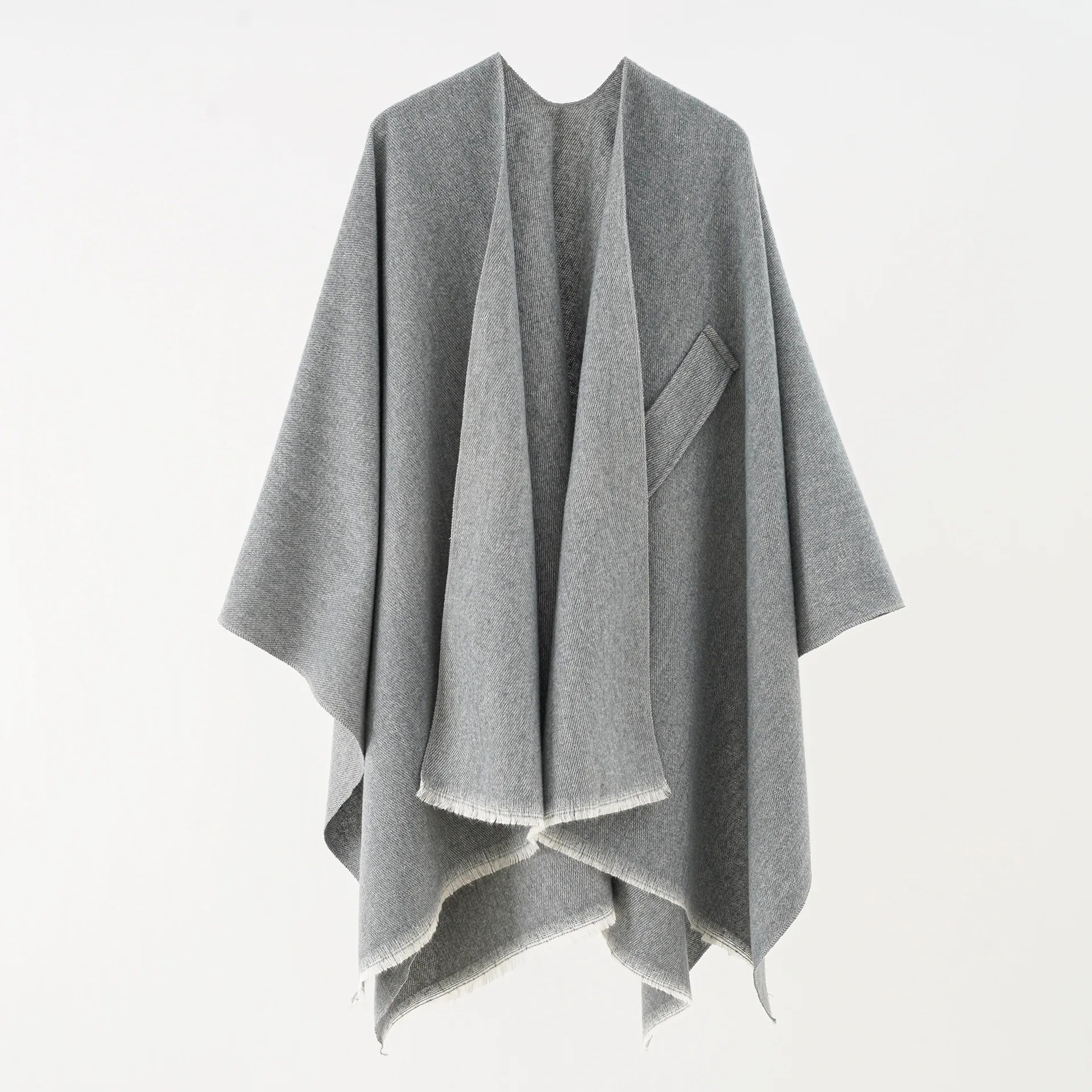 Light gray cashmere poncho with V-neck, draped sleeves, fringe hem