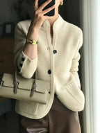 Off-white textured knit jacket with button front and stand collar