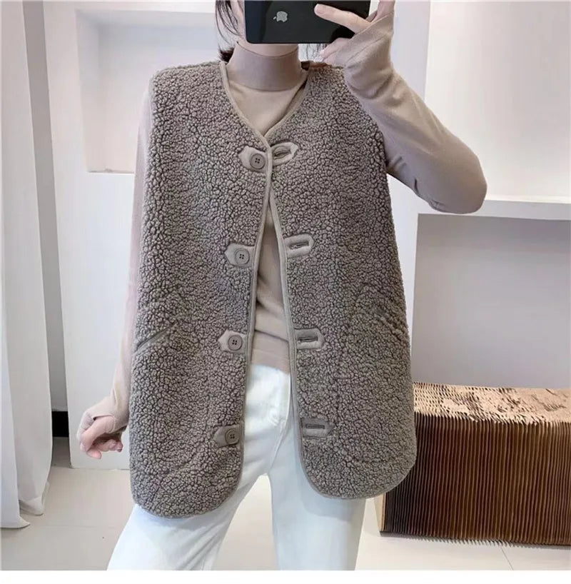 Gray sherpa wool gilet, sleeveless, V-neck with button front and flap pockets