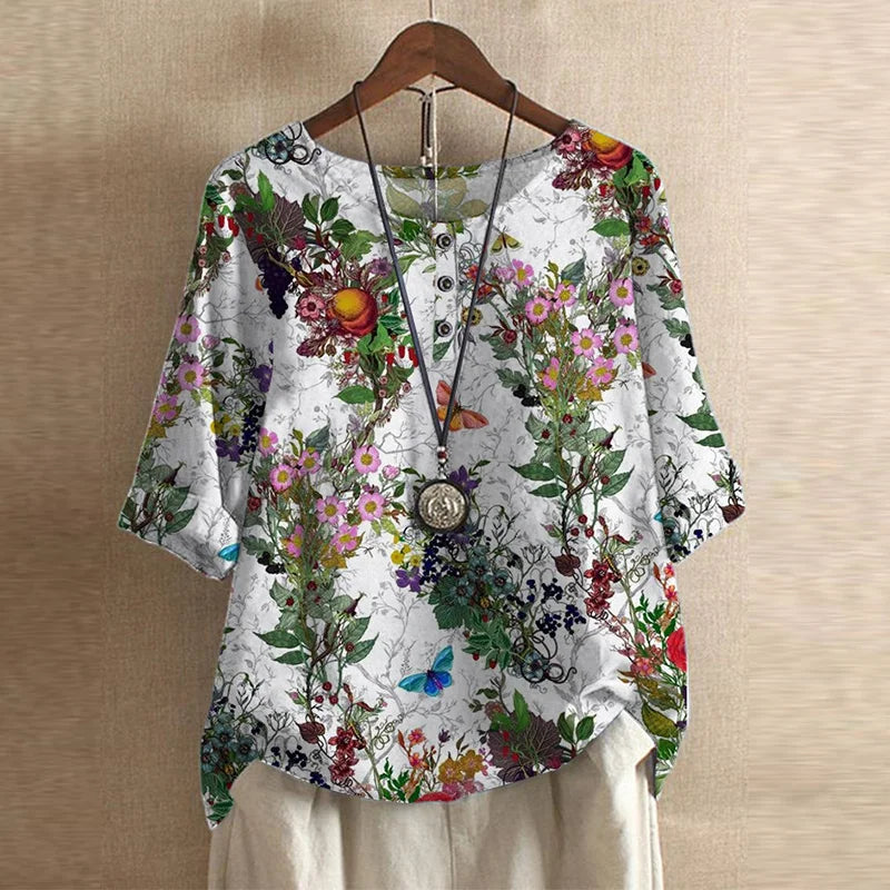 Women’s blouse in white with colorful garden floral print, short sleeves, button front