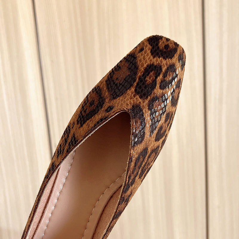 Leopard print loafer upper close-up with rounded cutout and tan lining