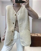 Wool gilet with button-front, cream sherpa fleece texture over white top